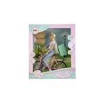 Mu-eca-Tiny-Y-Su-Bicicleta-Viajera-1-940877